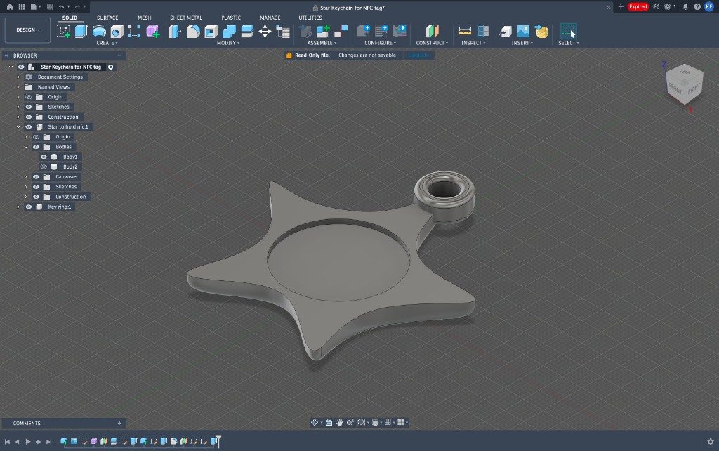 Fusion 360 model of a flat star NFC keychain with recessed tag pocket