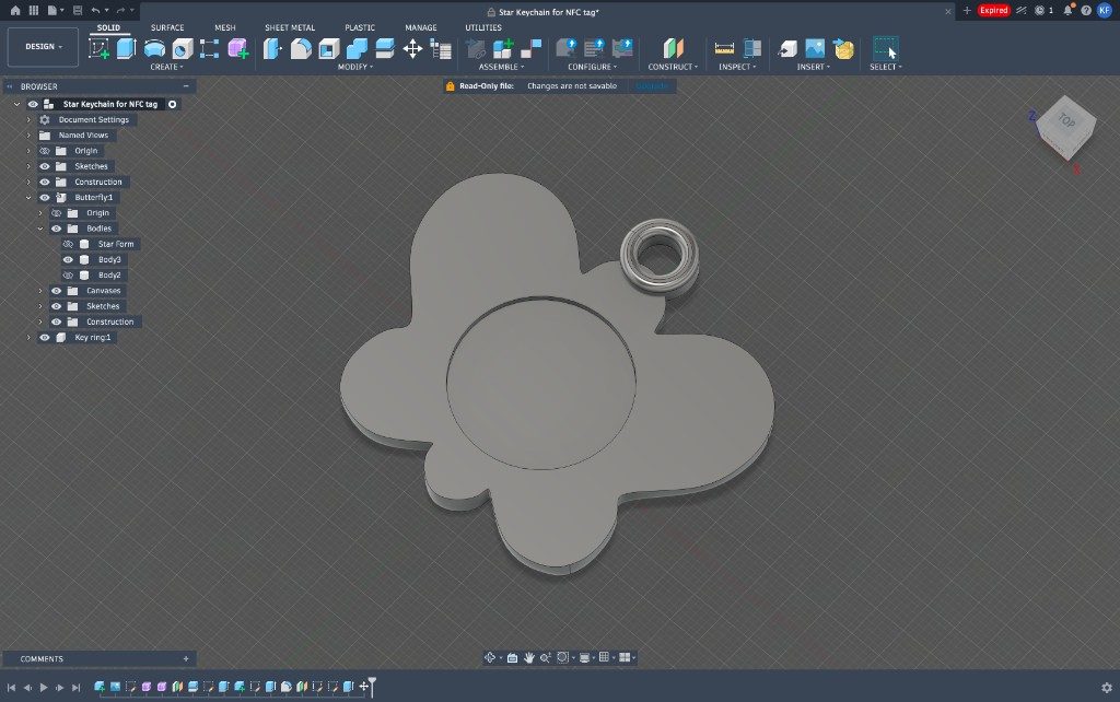 Fusion 360 model of a flat butterfly NFC keychain with recessed tag pocket