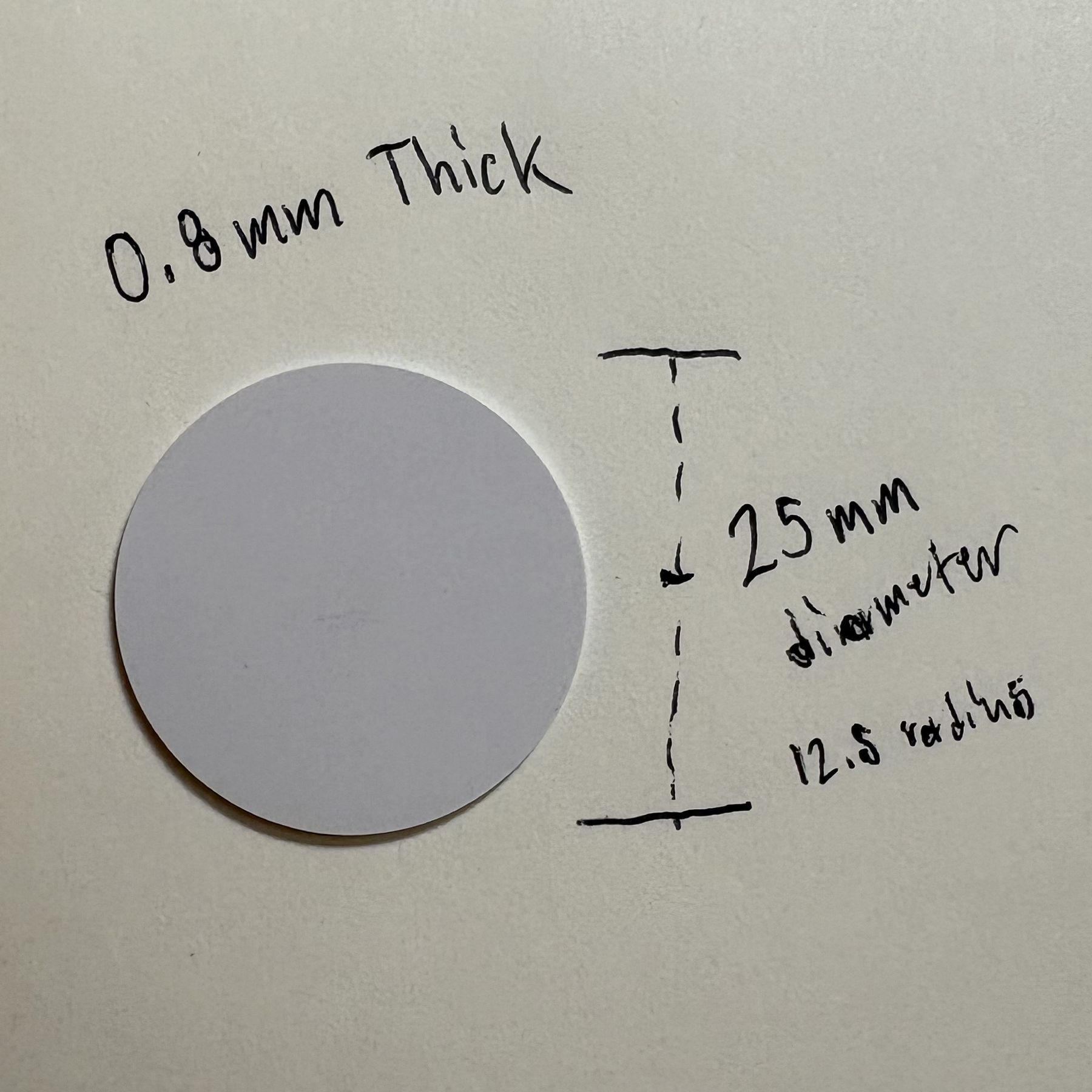 Round NFC tag measured at 25 millimeters across and 0.8 millimeters thick
