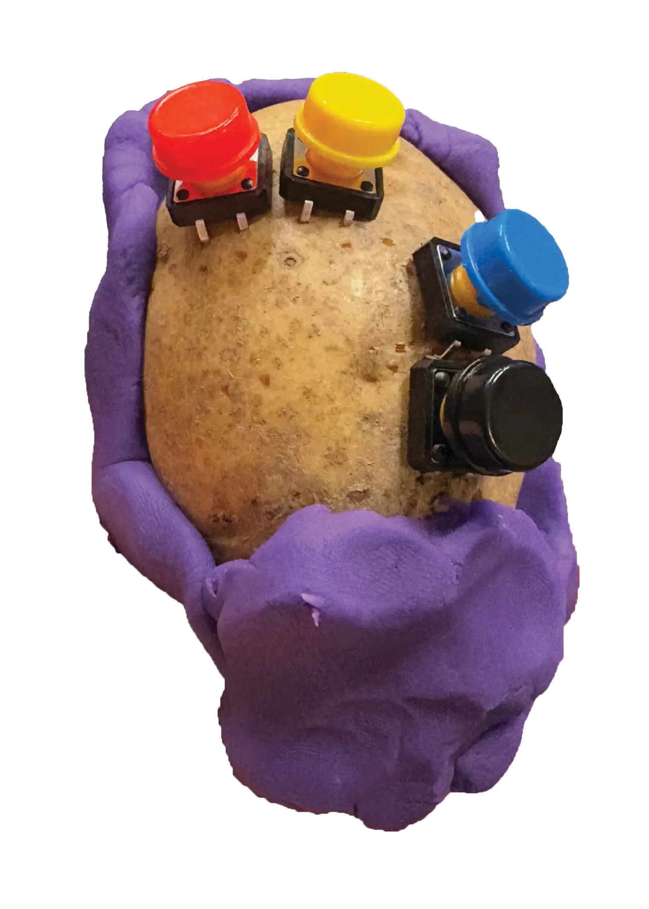 Potato controller prototype with purple Play-Doh grip and red, yellow, blue, and black buttons