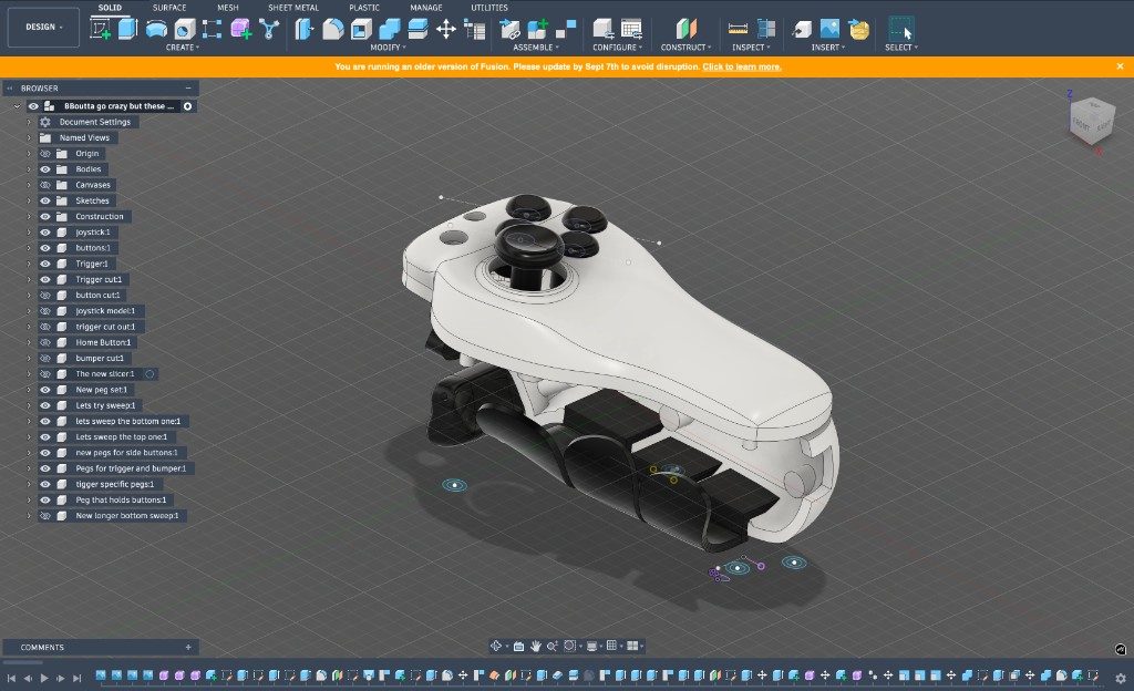 Fusion 360 cutaway of the final SPUD controller showing shell, triggers, and internal structure